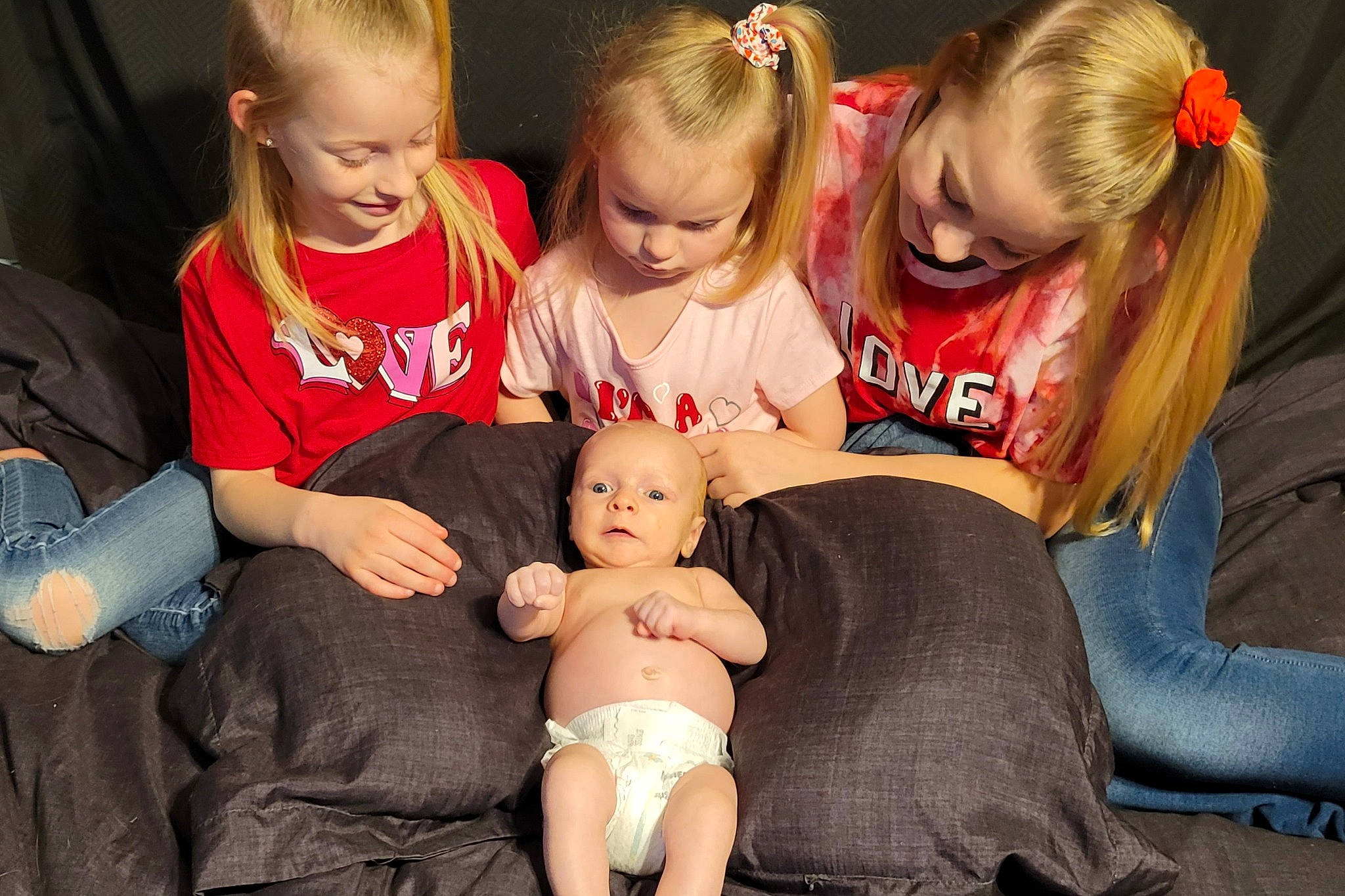 Rodney is registered to the contest to win money with this photo: child, comfort, couch, eye, face, facial_expression, fun, hair, happy, head, interaction, iris, lap, people, person, photograph, red, skin, smile, thigh