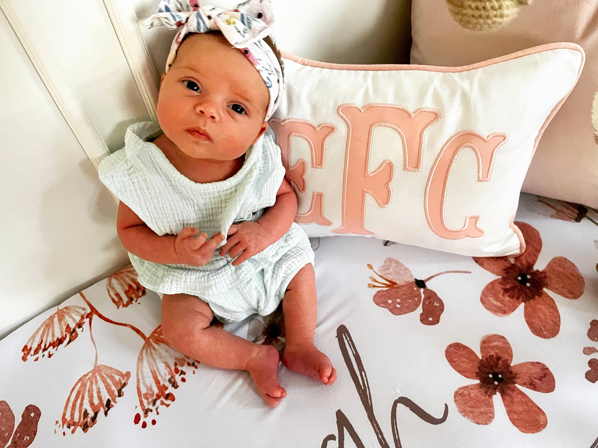 Everleigh joined the competition — help win amazing prizes! baby, baby_toddler_clothing, beauty, child, comfort, design, fashion_accessory, font, happy, headwear, linens, pattern, peach, person, photograph, pink, product, sitting, sleeve, textile