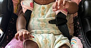 Milan joined the competition — help win amazing prizes! baby, baby_clothing, bottle, bow, car_seat, child, close_up, eyes, face, hand, harness, headband, indoor, infant, lying_down, pacifier, pink, portrait, rainbow_pattern, sitting