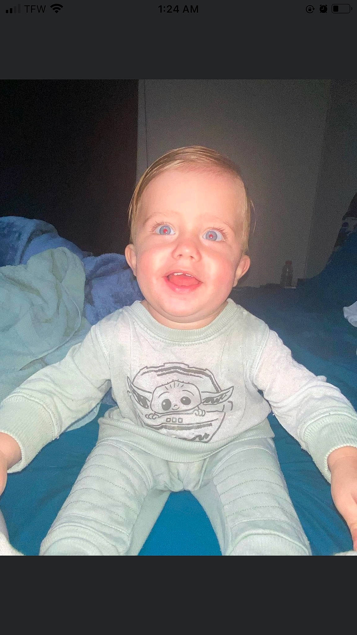 Langston is registered to the contest to win money with this photo: arm, baby_toddler_clothing, cheek, chin, clothing, comfort, eye, eyebrow, flash_photography, forehead, hand, head, iris, lip, mouth, neck, nose, person, skin, sleeve