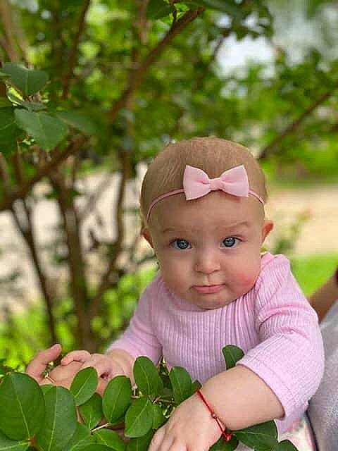 Katalina joined the competition — help win amazing prizes! baby, beauty, botany, cheek, child, face, grass, green, hand, head, headwear, leaf, lip, person, photograph, pink, plant, product, skin, spring