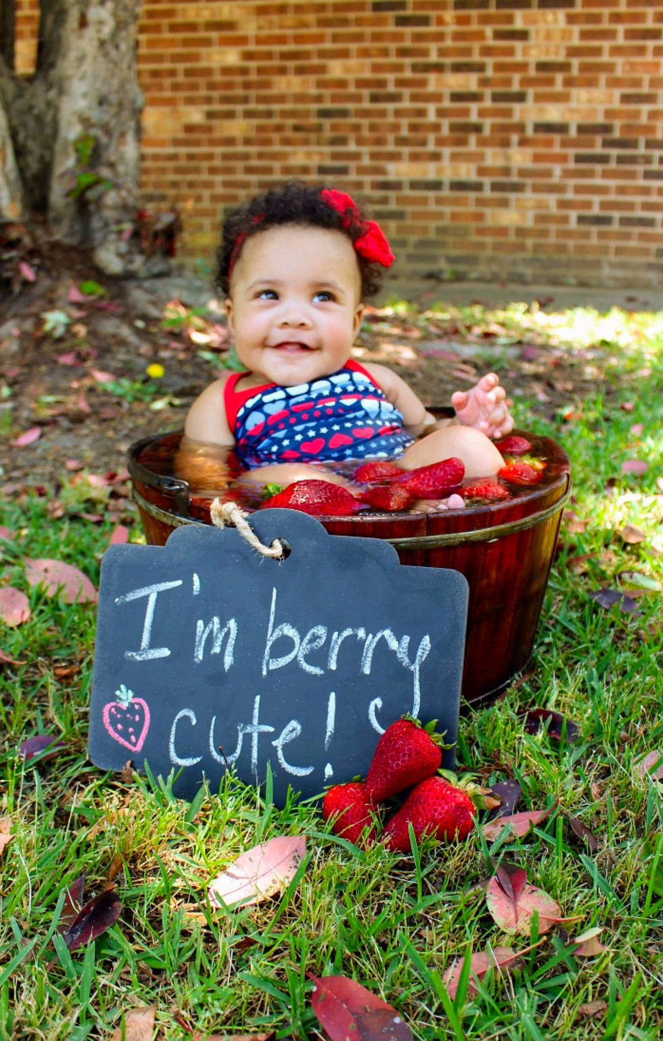 Amia is registered to the contest to win money with this photo: baby, child, garden, grass, happy, leaf, person, photography, plant, red, smile, toddler, tree, yard