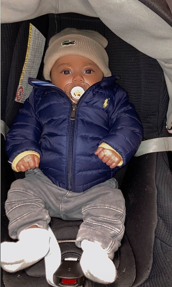 Giuseppe participe au concours pour gagner de l'argent avec cette photo : baby, baby_toddler_clothing, beanie, cap, cheek, child, comfort, doll, electric_blue, headwear, jacket, lap, outerwear, person, sitting, sleeve, toddler, toy