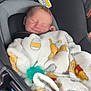 Levi is registered to the contest to win money with this photo: newborn, baby, blanket, car_seat, pacifier, sleeping, infant, cozy, child, cute, comfort, soft, winnie_the_pooh, pattern, fabric, rest, peaceful, indoor, seat, smile