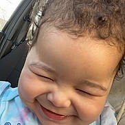 Analaiah is registered to the contest to win money with this photo: toddler, child, smiling, curly_hair, car_seat, shirt, tie_dye, happy, face, portrait, indoors, seatbelt, sunlight, closeup, baby, person, cute, cheerful, clothing, infant