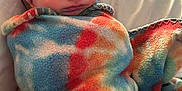 Jason joined the competition — help win amazing prizes! newborn, baby, sleeping, blanket, tie_dye, hat, hospital_bed, infant, peaceful, swaddled, child, face, portrait, close_up, resting, soft, cute, cozy, indoor, person