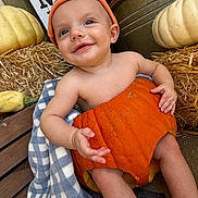 Dawson joined the competition — help win amazing prizes! baby, child, infant, smiling, portrait, pumpkin, autumn, fall, halloween, gourds, hay, hay_bale, orange, outdoor, seasonal, costume, headband, blanket, sitting, happy