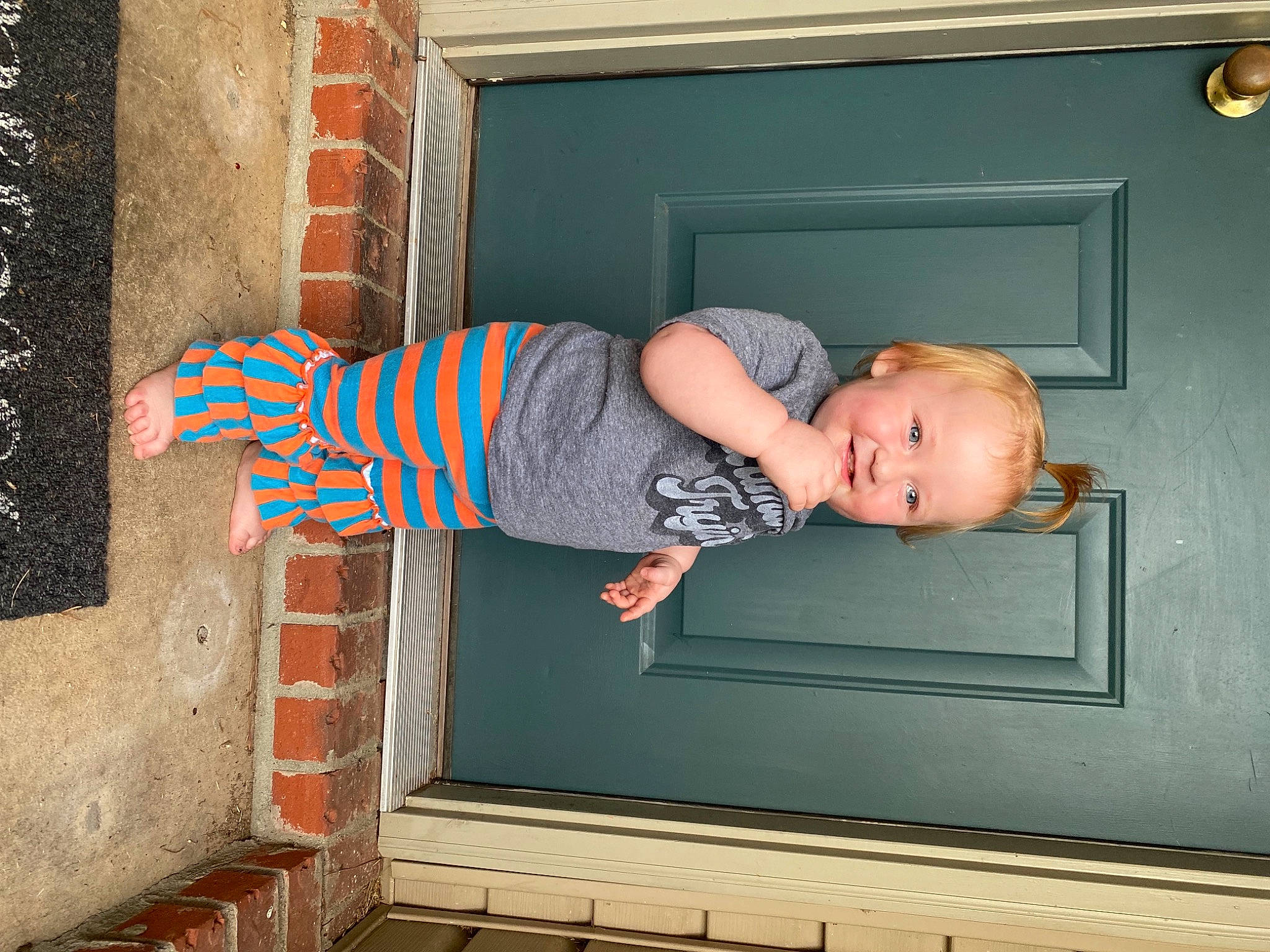 Paisley joined the competition — help win amazing prizes! baby, baby_toddler_clothing, brick, brickwork, child, comfort, composite_material, design, elbow, electric_blue, floor, flooring, fun, joy, mammal, person, rectangle, sitting, standing, t_shirt