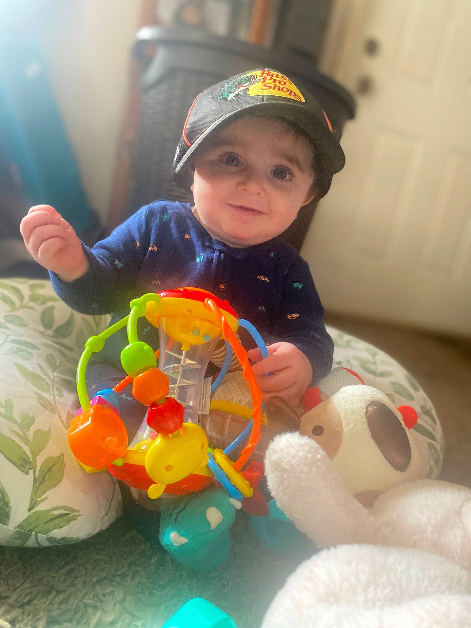 Damon joined the competition — help win amazing prizes! baby_products, baby_toddler_clothing, baby_toys, ball, baseball_cap, cap, child, fun, happy, headwear, joy, leisure, person, personal_protective_equipment, play, plush, recreation, room, sitting, stuffed_toy