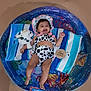 Astoria is registered to the contest to win money with this photo: baby, infant, smiling, pool, inflatable_pool, towel, plush_toy, cow_print, hat, clothing, child, cute, happy, indoor, toy, water, five_months, skin, foot, hand