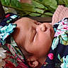 Emma joined the competition — help win amazing prizes! newborn, baby, sleeping, floral, blanket, headband, flower, greenery, closeup, peaceful, infant, soft, portrait, child, wrapped, cute, nature, delicate, resting, skin