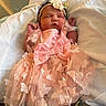 newborn, baby, sleeping, pink_dress, butterfly, headband, flower, blanket, infant, cute, resting, soft, adorable, child, indoors, portrait, peaceful, cozy, tulle, wrapped