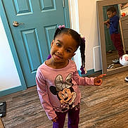 Iliyah is registered to the contest to win money with this photo: child, girl, boy, mirror, indoor, floor, door, clothing, hair_beads, playful, pose, smile, reflection, wood_floor, purple_pants, pink_shirt, blue_shirt, sneakers, toy_ball, room