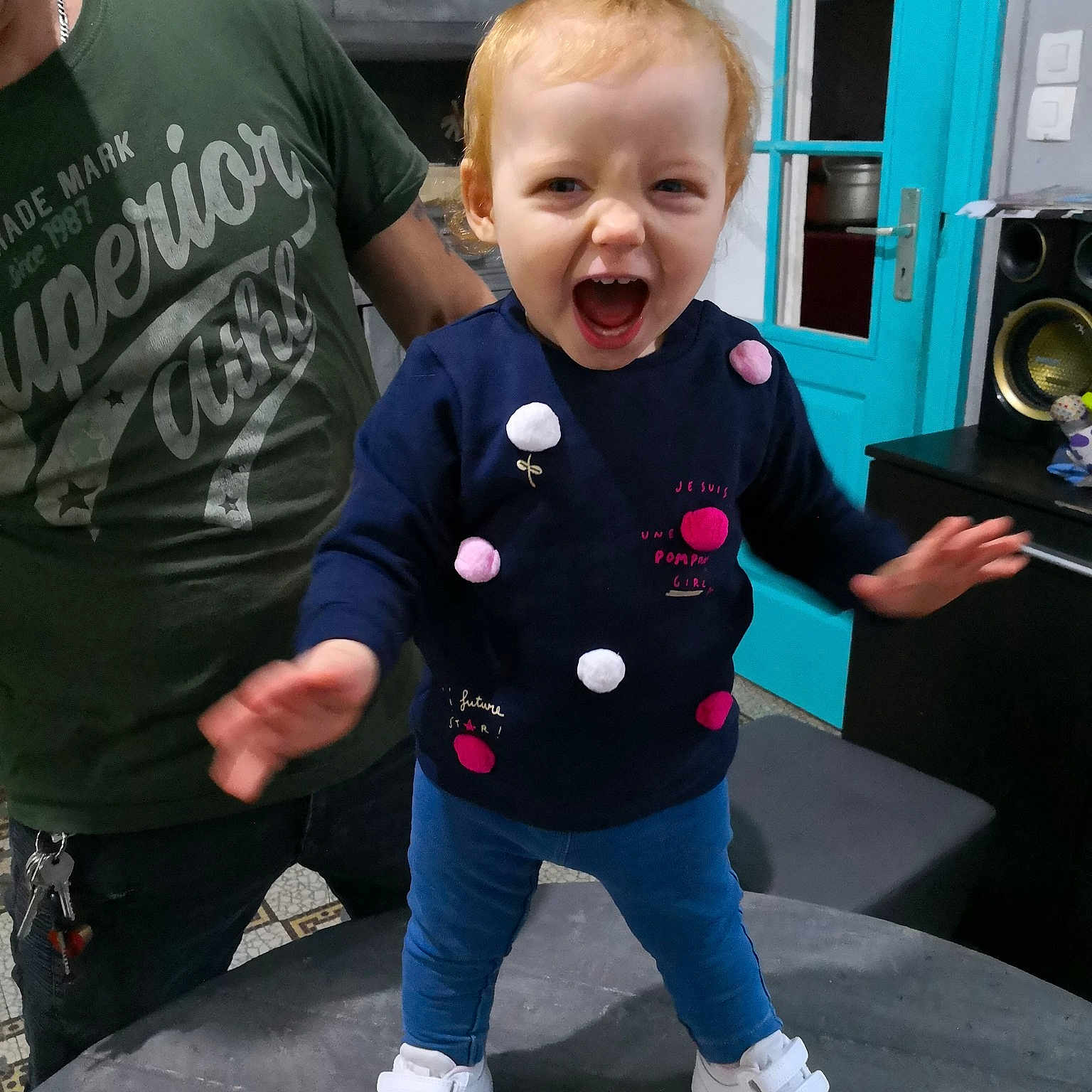 Lyna participe au concours pour gagner de l'argent avec cette photo : boy, child, costume, fun, outerwear, person, product, shoulder, sleeve, smile, standing, t_shirt, toddler