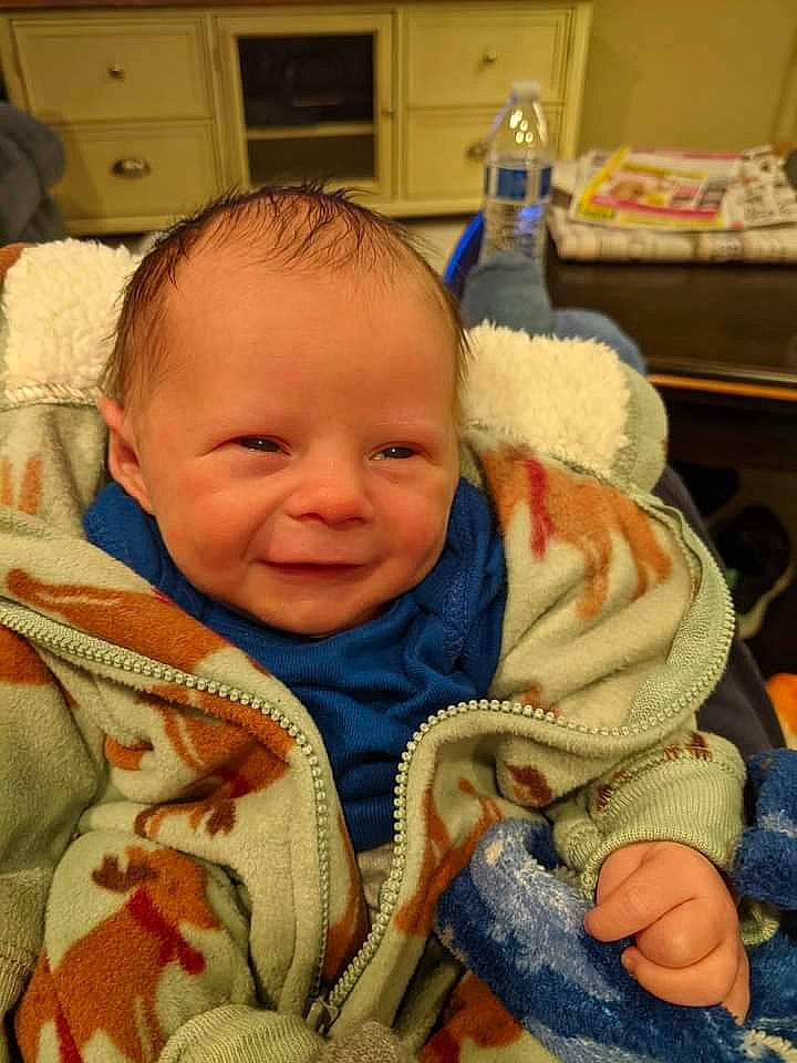 Henley joined the competition — help win amazing prizes! baby, baby_toddler_clothing, cheek, child, chin, comfort, eye, face, facial_expression, happy, head, human_body, iris, linens, mouth, nose, person, room, skin, smile