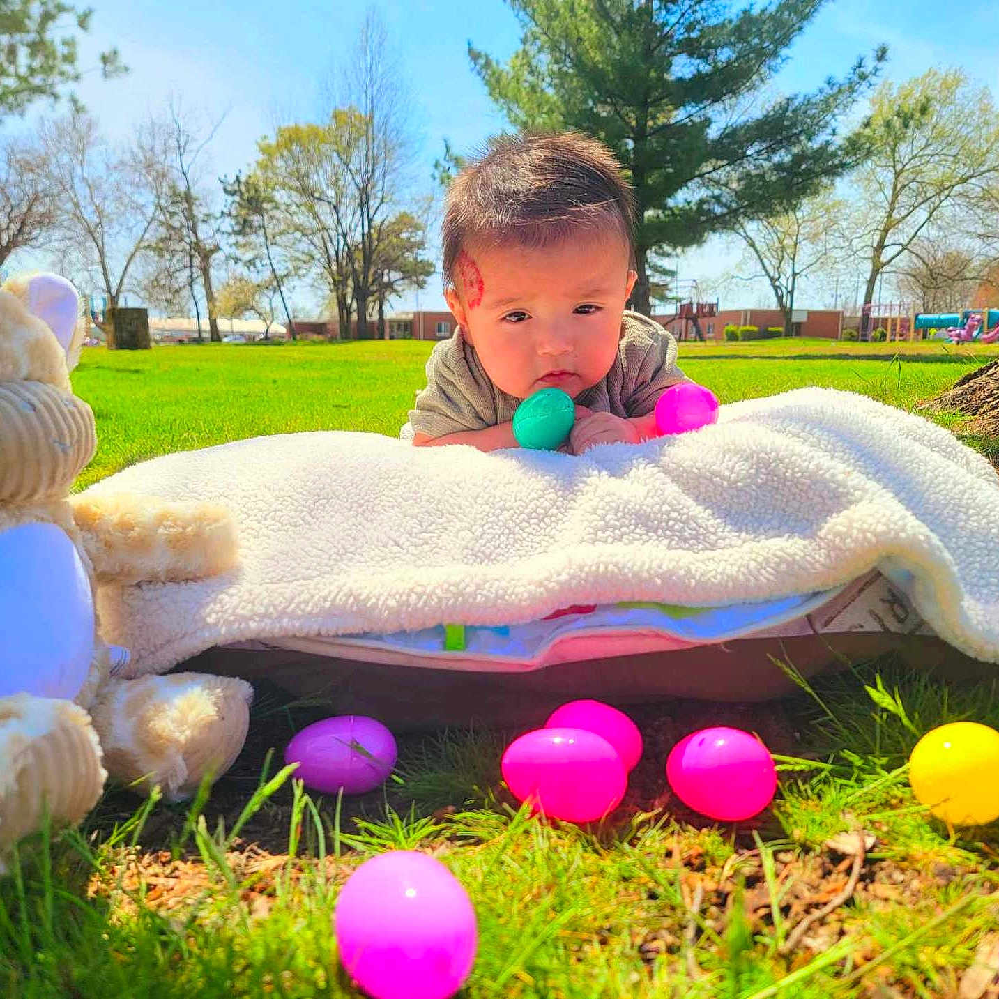 Oliver joined the competition — help win amazing prizes! architecture, baby, balloon, blanket, building, face, grass, head, nature, outdoors, park, person, photography, plant, portrait, purple, shelter, tree, vegetation, yard