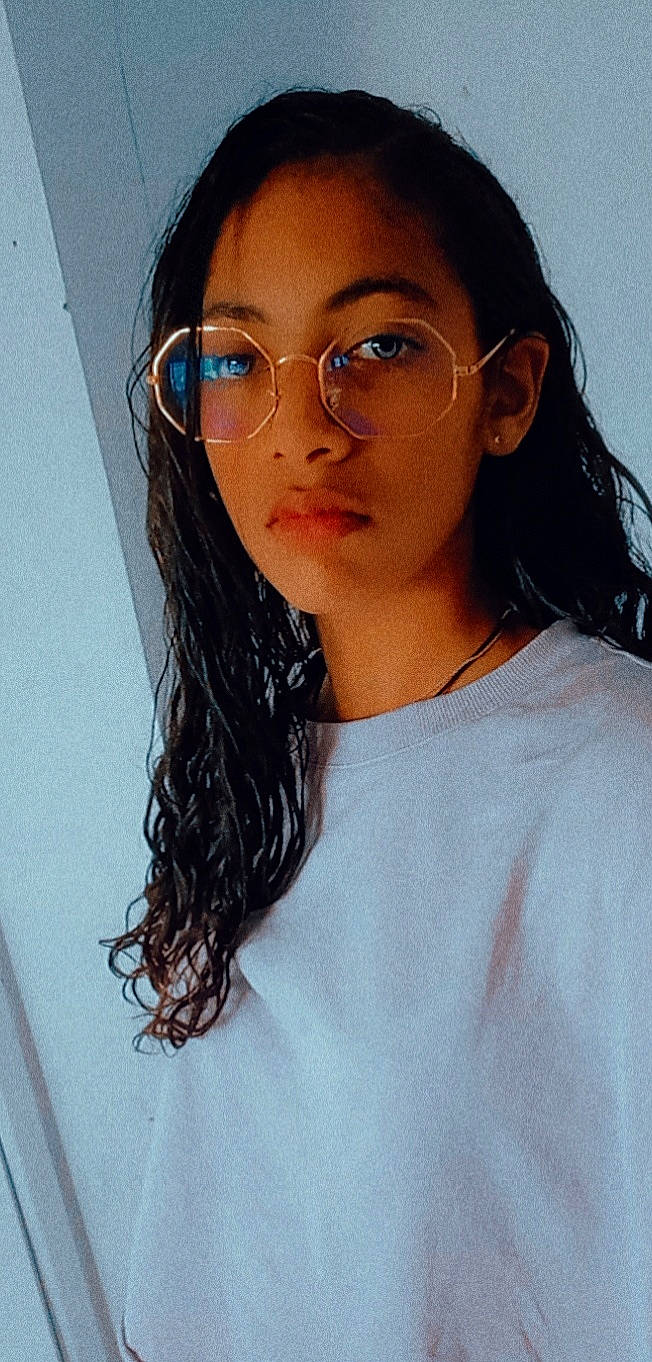 Shaznah participe au concours pour gagner de l'argent avec cette photo : black_hair, cheek, chin, cool, eyebrow, eyelash, eyewear, forehead, glasses, hair, head, jaw, layered_hair, lip, neck, nose, outerwear, person, skin, sleeve