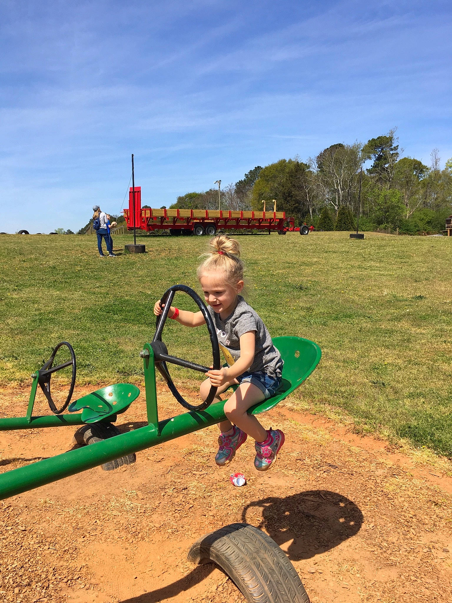 Taylor is registered to the contest to win money with this photo: bicycle, cloud, cycling, fun, grass, grassland, human_settlement, landscape, leisure, mountain, person, play, playground, public_space, recreation, rural_area, sky, soil, summer, vacation