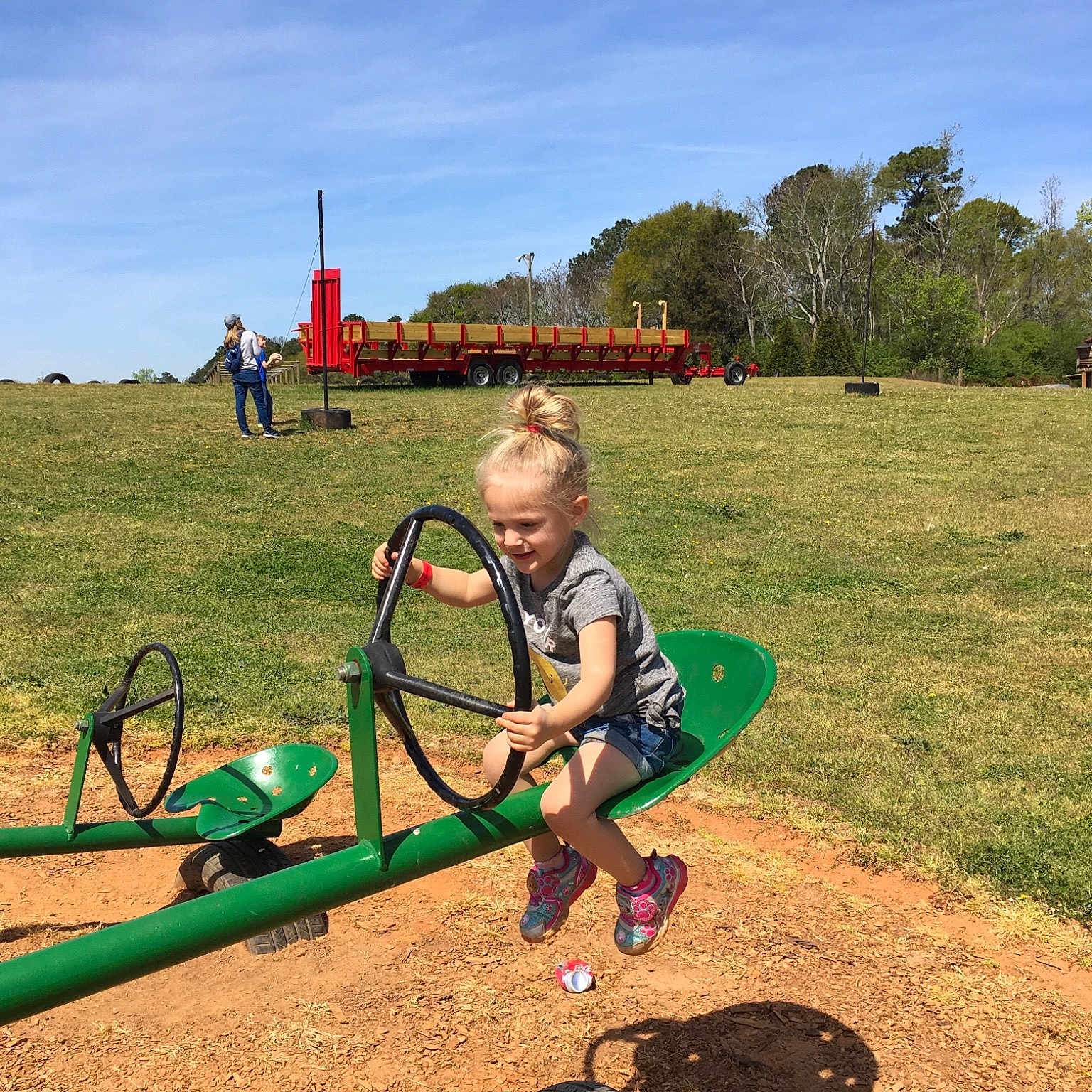 Taylor is registered to the contest to win money with this photo: bicycle, cloud, cycling, fun, grass, grassland, human_settlement, landscape, leisure, mountain, person, play, playground, public_space, recreation, rural_area, sky, soil, summer, vacation