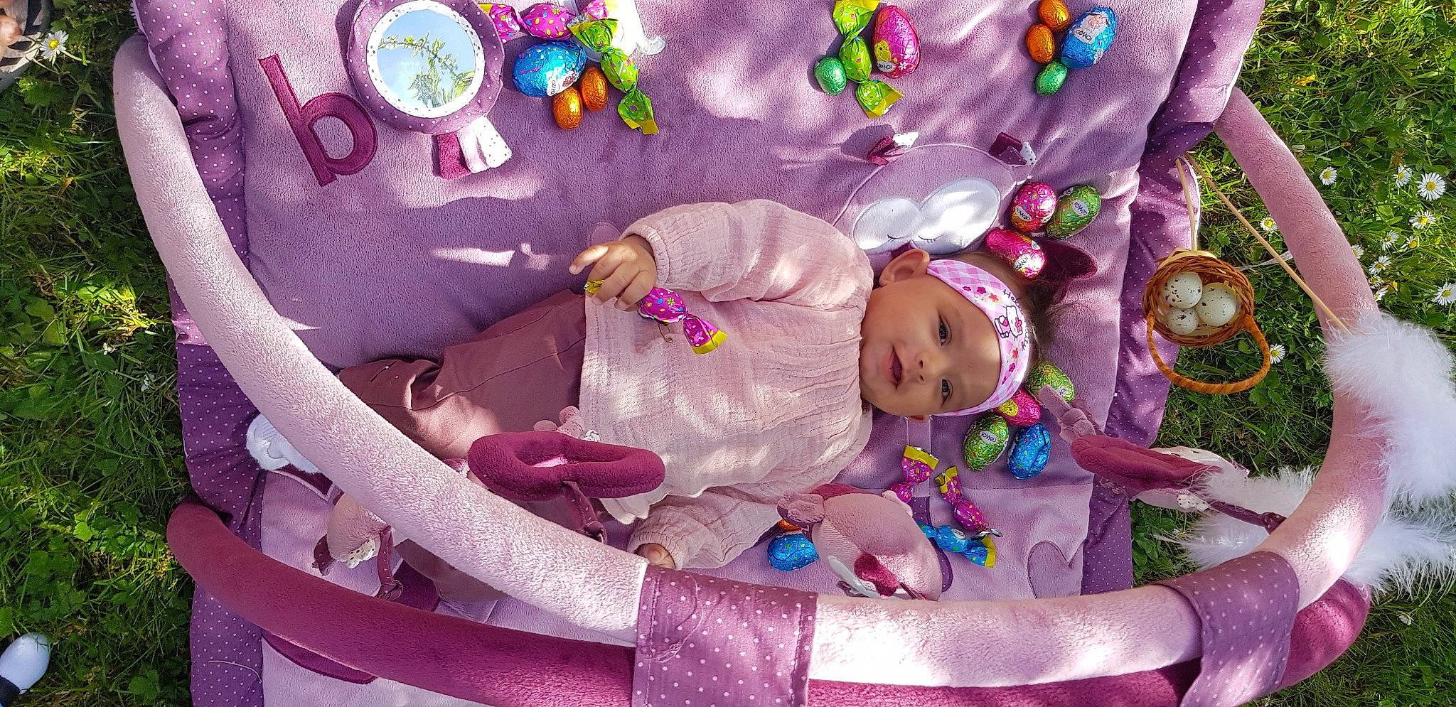 Kayla a rejoint le concours — aidez-le/la à gagner de superbes lots ! baby, baby_products, baby_toys, child, doll, headwear, infant_bed, lilac, person, photography, pink, play, product, purple, toddler, toy, violet