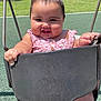 baby, child, swing, playground, outdoor, smiling, happy, grass, summer, sunny, cute, pink_clothing, person, infant, fun, seat, park, daylight, cheeks, joy