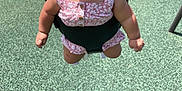 Athena is registered to the contest to win money with this photo: baby, child, swing, playground, smile, happy, outdoor, sunlight, grass, shadow, infant, clothing, summer, fun, park, cute, person, face, play, daylight