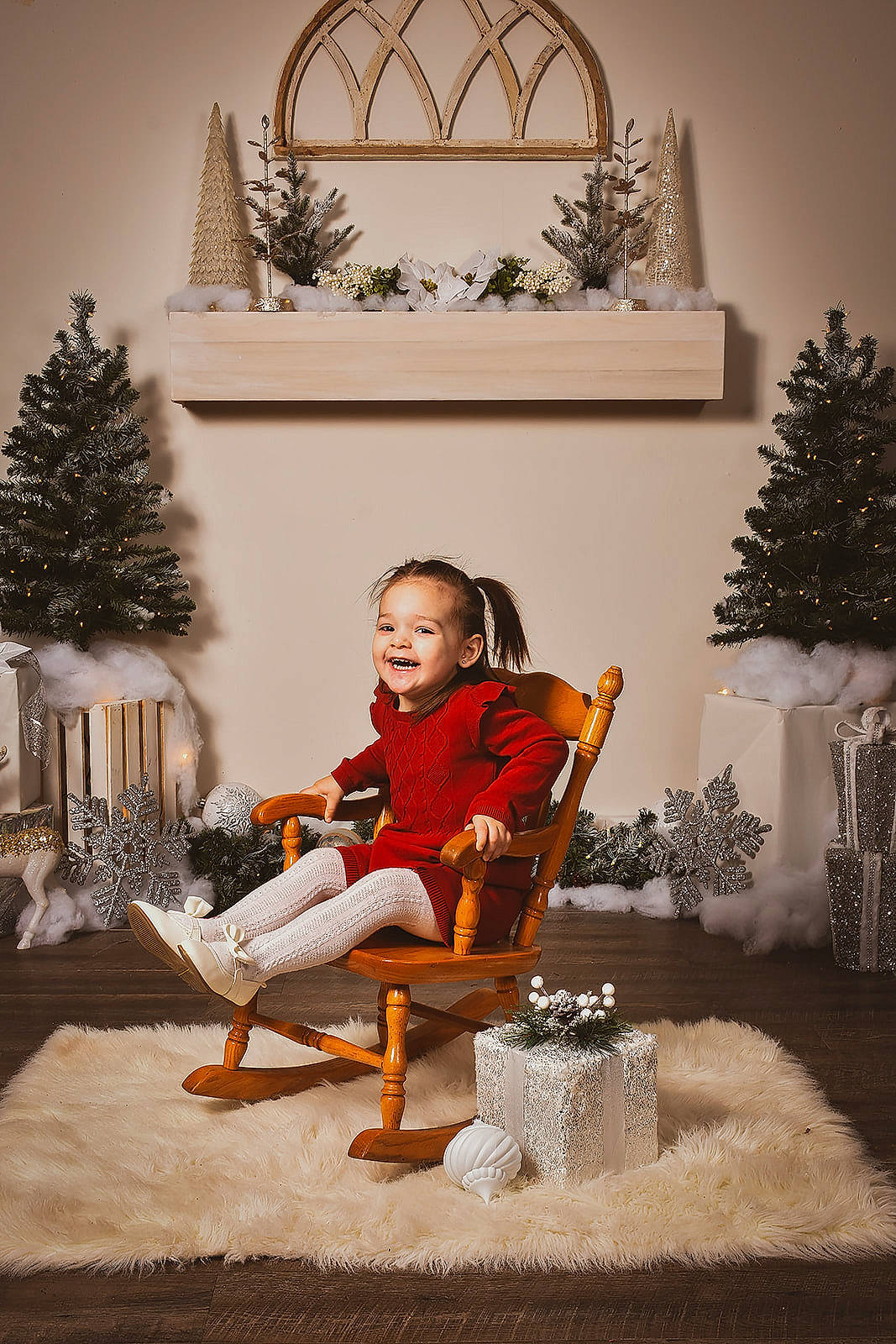 Alayah is registered to the contest to win money with this photo: chair, christmas, christmas_decoration, christmas_eve, christmas_ornament, christmas_tree, comfort, conifer, event, evergreen, holiday, holiday_ornament, interior_design, joy, living_room, ornament, person, plant, sitting, tree