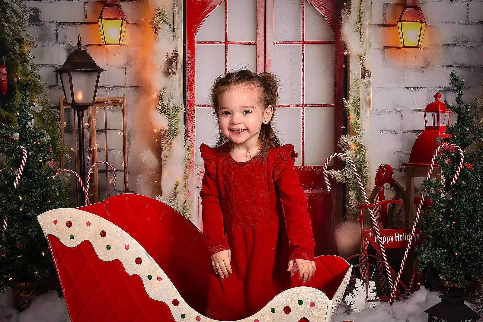Alayah joined the competition — help win amazing prizes! christmas, christmas_decoration, christmas_ornament, christmas_tree, decoration, event, fun, happy, holiday, joy, lap, ornament, pattern, person, red, sitting, smile, snapshot, toddler, tradition