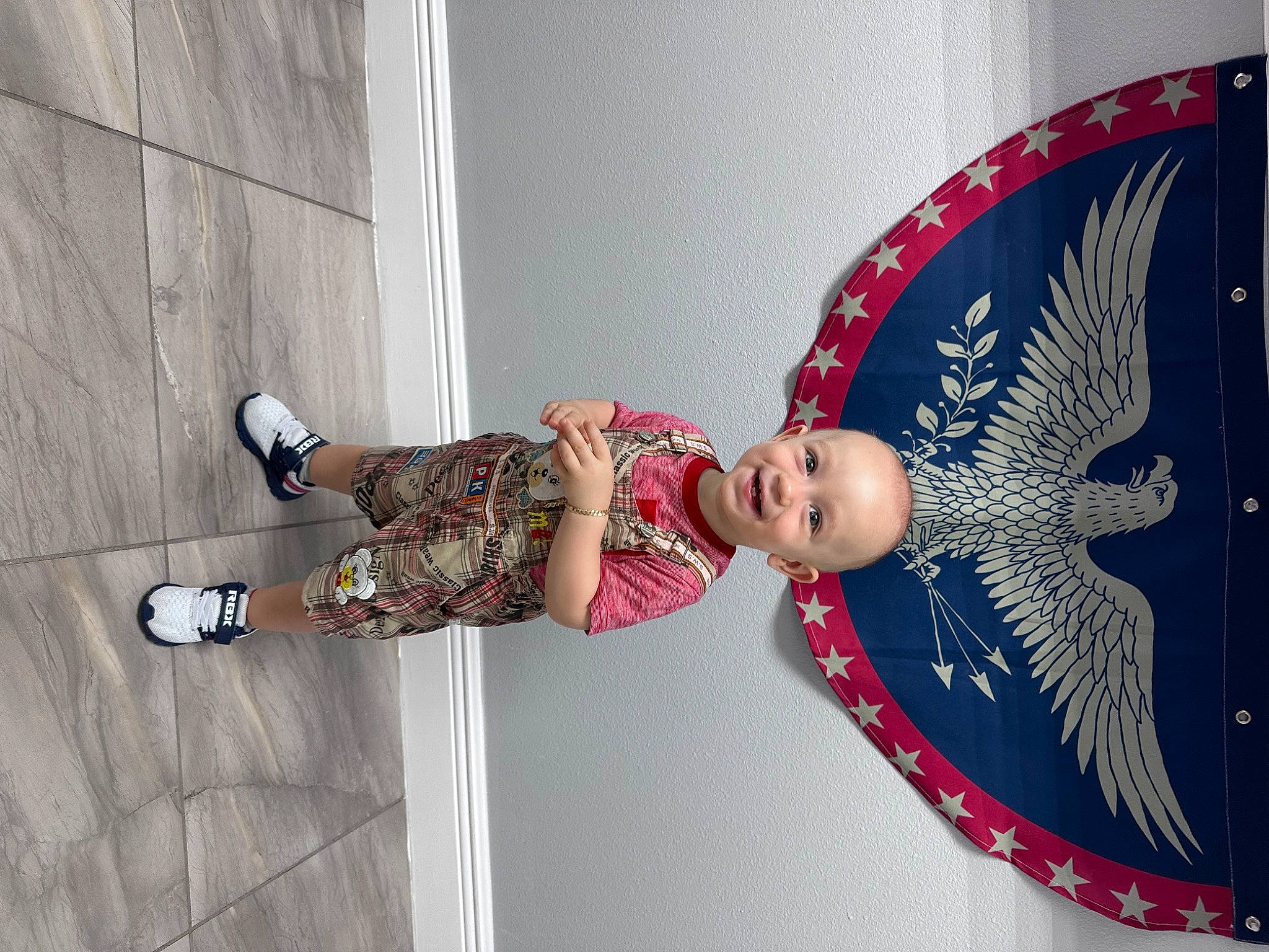 Enrique joined the competition — help win amazing prizes! art, carmine, child, costume, dress, fashion_accessory, fashion_design, human_leg, joy, magenta, pattern, person, room, sandal, thigh, toddler, visual_arts, wood