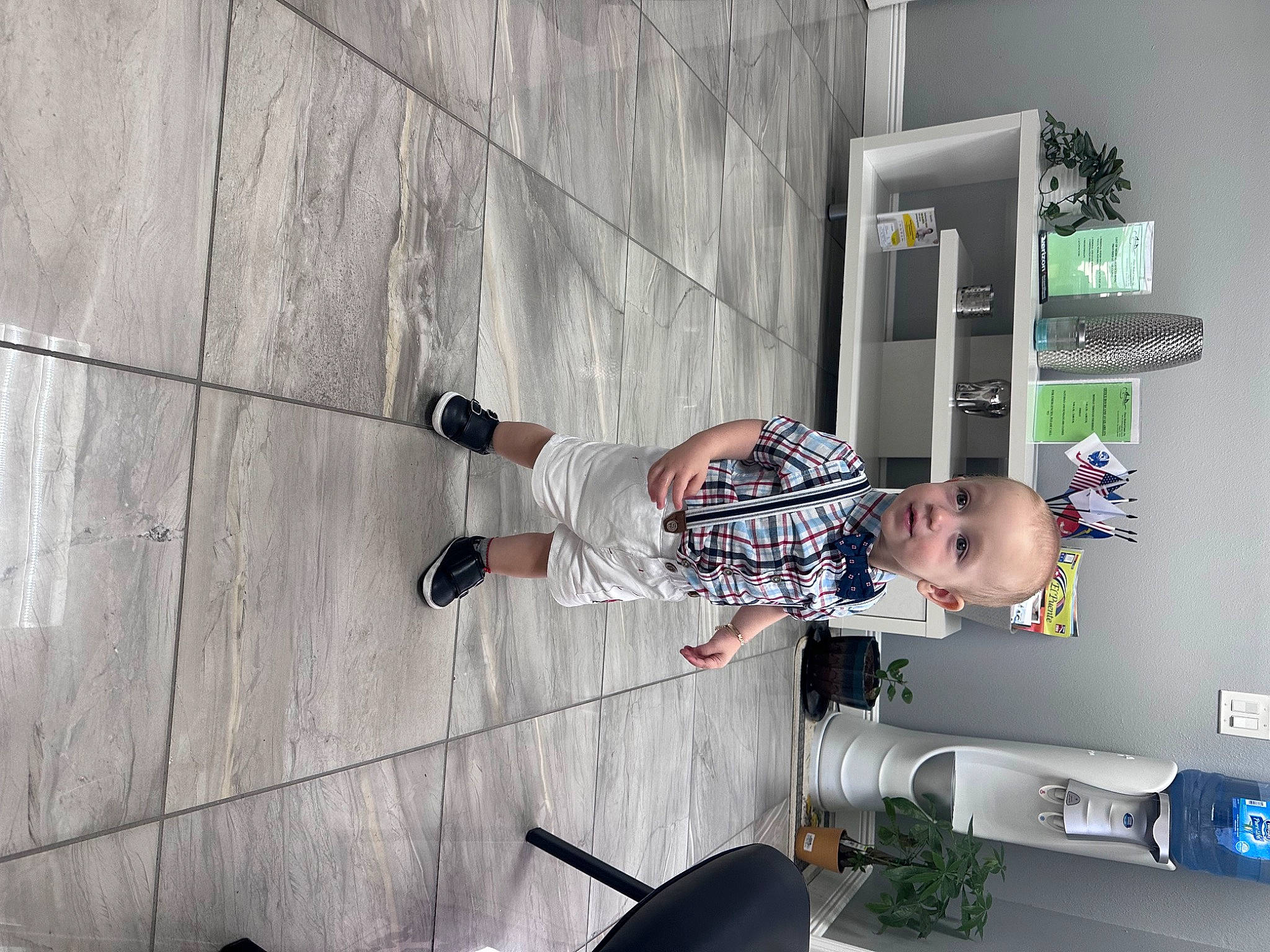 Enrique joined the competition — help win amazing prizes! building, ceiling, chair, concrete, flooring, house, human_leg, machine, person, room, shelving, t_shirt, toddler, walking_shoe, wall