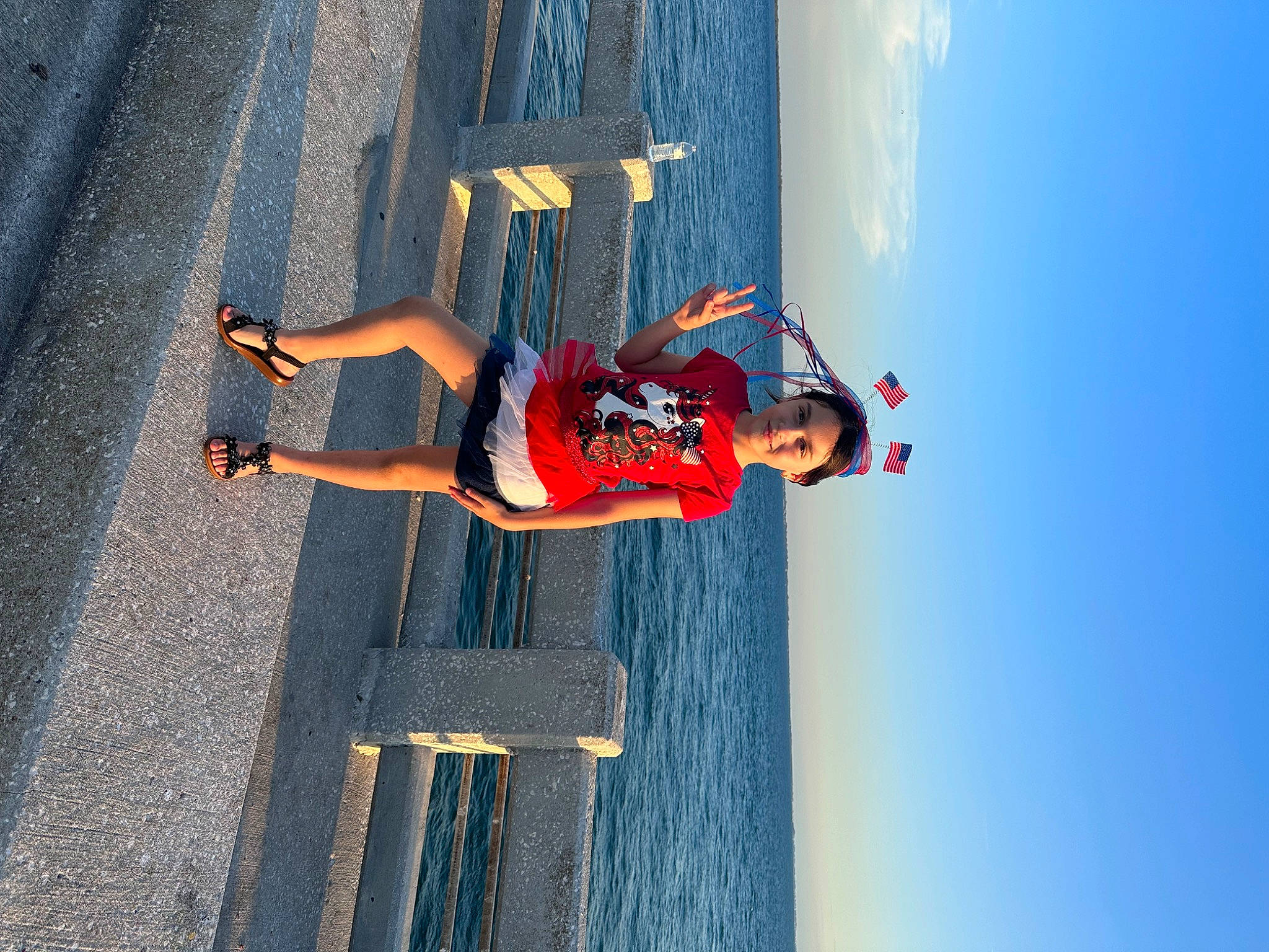 Emily is registered to the contest to win money with this photo: adventure, asphalt, blue, cloud, elbow, electric_blue, extreme_sport, fun, human_leg, joy, knee, leisure, outdoor_shoe, person, recreation, shadow, shorts, sky, sports, thigh