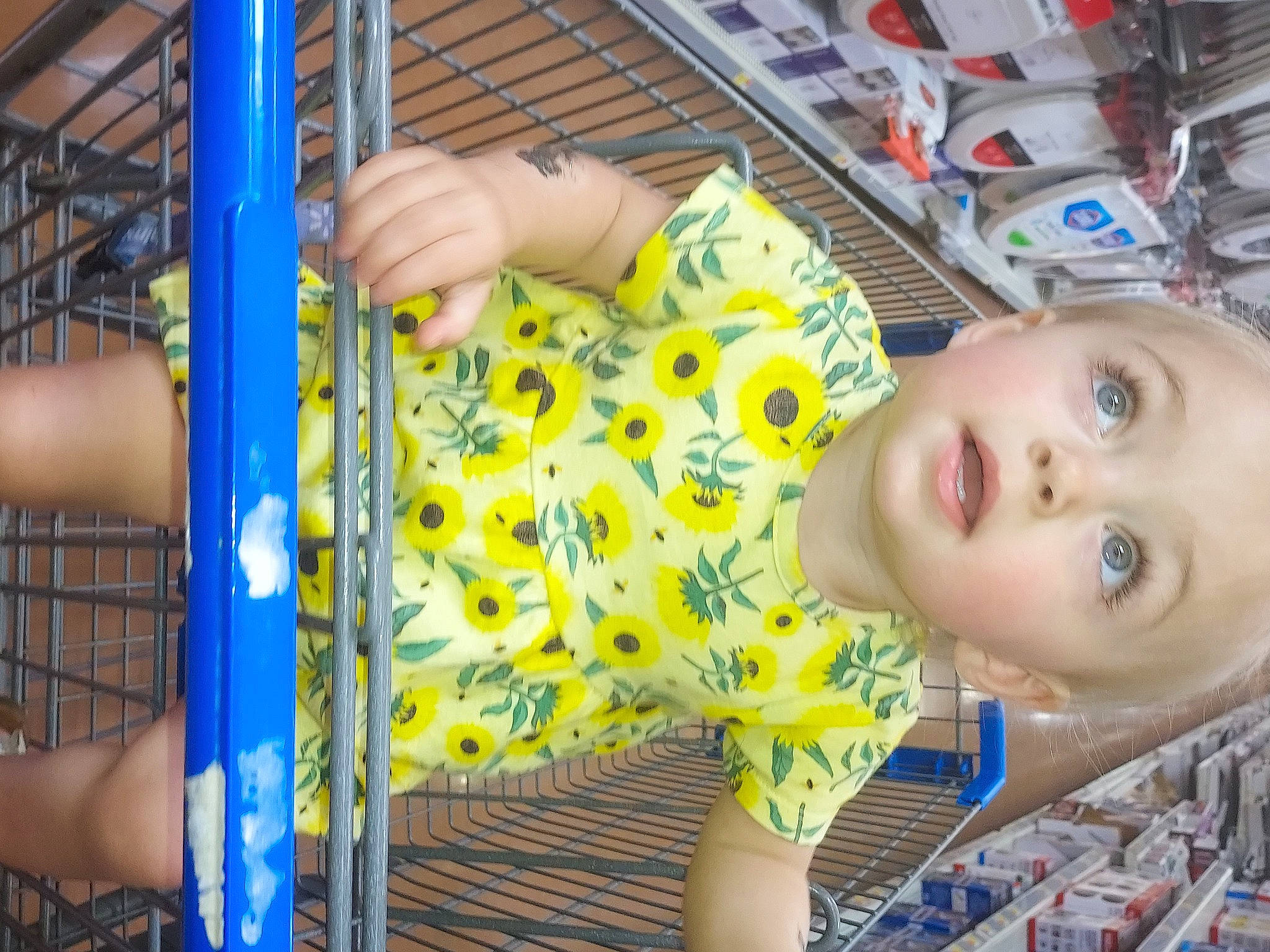 Nova is registered to the contest to win money with this photo: baby, baby_safety, baby_toddler_clothing, blue, child, eye, facial_expression, finger, fun, human, human_body, joint, leisure, mouth, people, person, skin, surprise, thigh, toddler