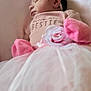 Kiya joined the competition — help win amazing prizes! baby, newborn, pink, headband, bow, mittens, tutu, rose, sleeping, soft, blanket, portrait, cute, infant, clothing, closeup, resting, indoor, adorable, child