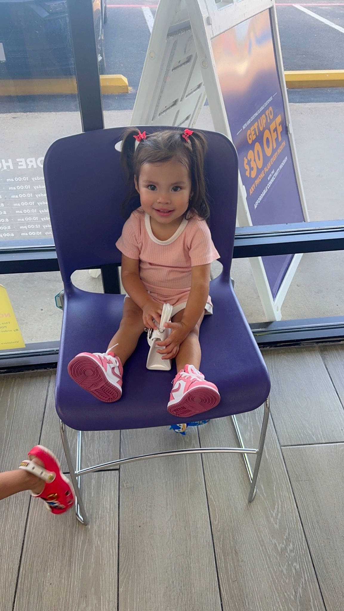 Ryleigh joined the competition — help win amazing prizes! baby_toddler_clothing, child, elbow, electric_blue, foot, fun, happy, human_leg, joy, knee, lap, leisure, person, sandal, shoe, shorts, sitting, smile, sneakers, thigh