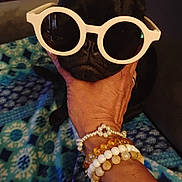 Raven is registered to the contest to win money with this photo: accessories, baby, bead, beadnecklace, bodypart, bracelet, diamond, finger, gemstone, glasses, goggles, hand, jewelry, ornament, person, prayer, prayerbeads, ring, sunglasses, wrist