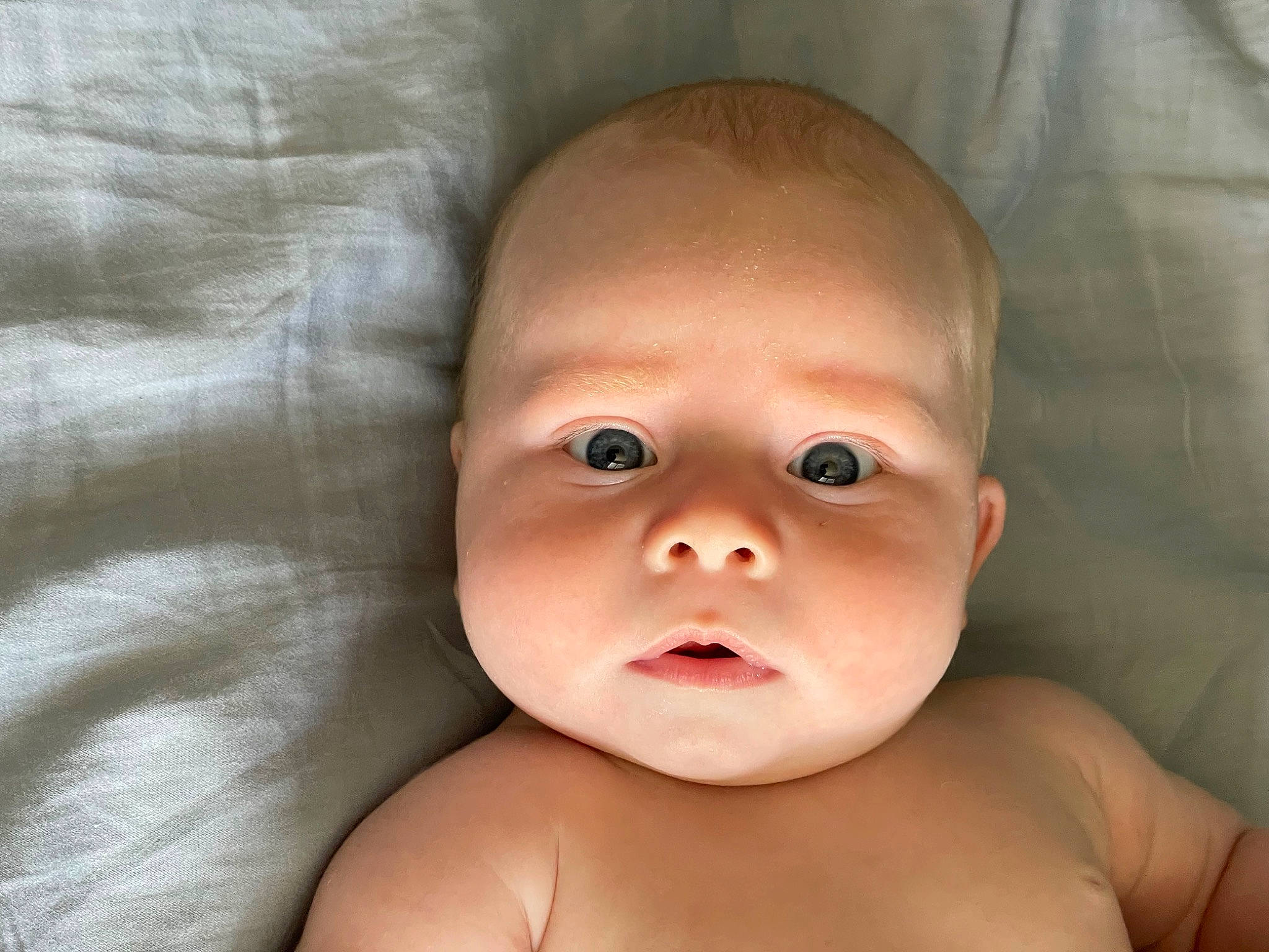 Honey is registered to the contest to win money with this photo: arm, baby, cheek, chest, ear, eye, eyelash, face, hair, hand, happy, human_body, iris, lip, neck, nose, person, stomach, thumb, toddler