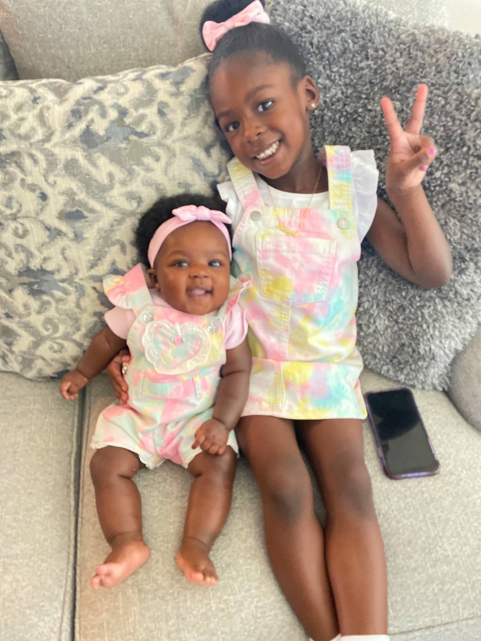 Zaire joined the competition — help win amazing prizes! baby_toddler_clothing, face, facial_expression, fun, gesture, hairstyle, happy, head, human_body, joy, leg, people, person, photograph, pink, shorts, skin, smile, summer, t_shirt