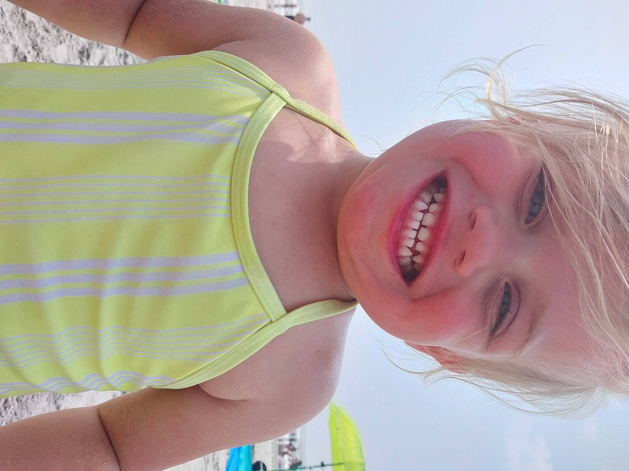 Addyson is registered to the contest to win money with this photo: baby, chest, child, elbow, eyelash, fun, gesture, grass, happy, joy, leisure, light, lip, mouth, neck, nose, person, pink, skin, smile