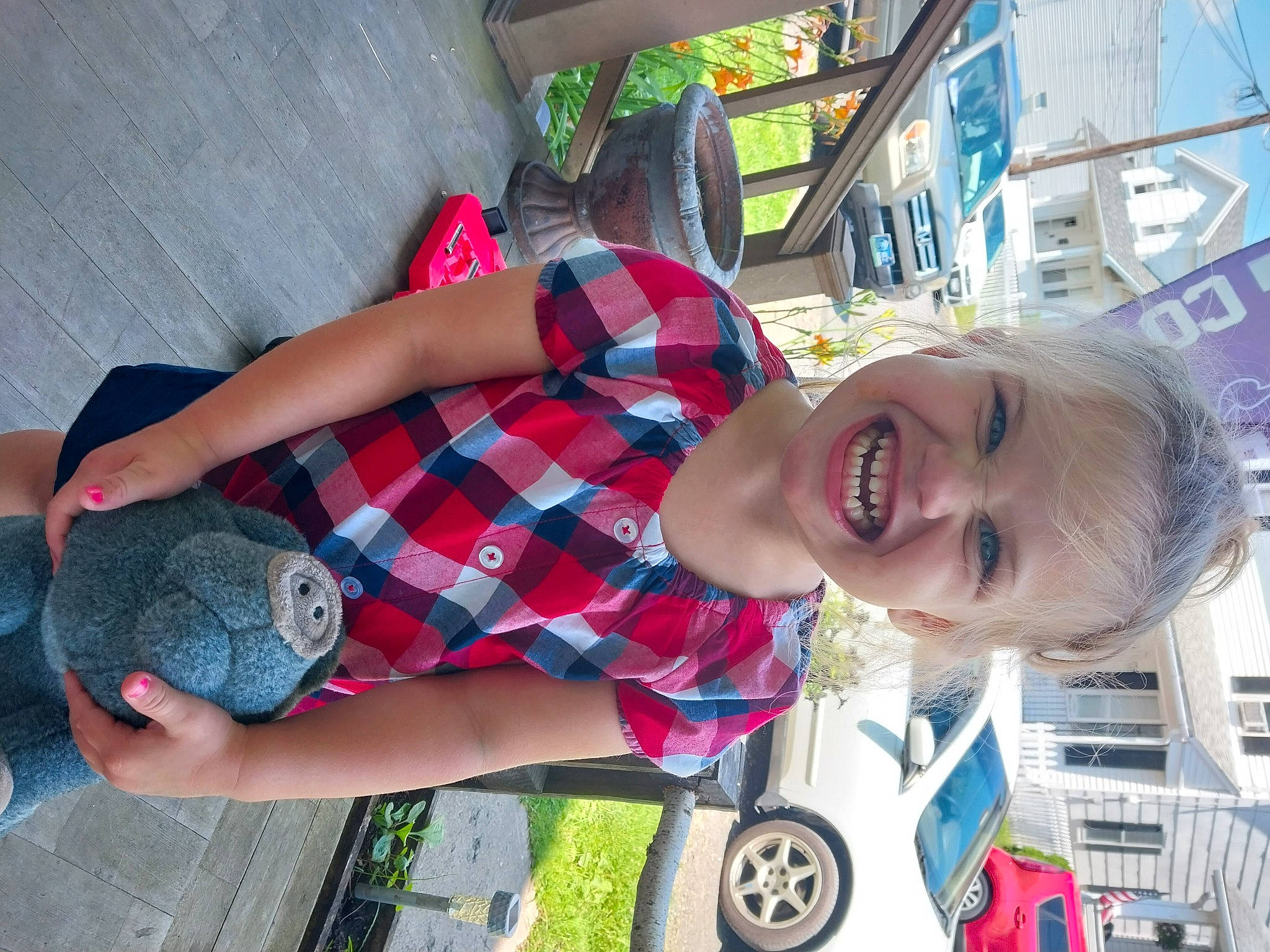 Addyson is registered to the contest to win money with this photo: automotive_tire, automotive_wheel_system, car, eyewear, fun, happy, human_leg, joy, leisure, motor_vehicle, pattern, person, plaid, plant, smile, sunglasses, tartan, tire, toy, travel