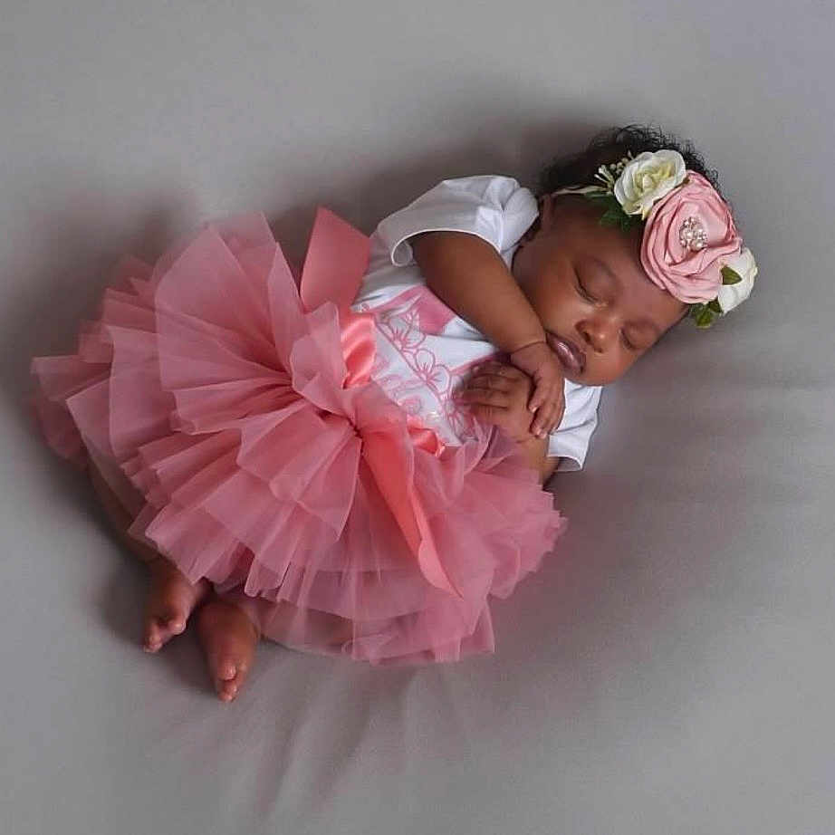 Madolyn joined the competition — help win amazing prizes! baby, sleeping, tutu, pink, flower_headband, curled_up, soft_surface, infant, cute, peaceful, adorable, newborn, child, portrait, clothing, resting, baby_girl, toddler, headwear, laying