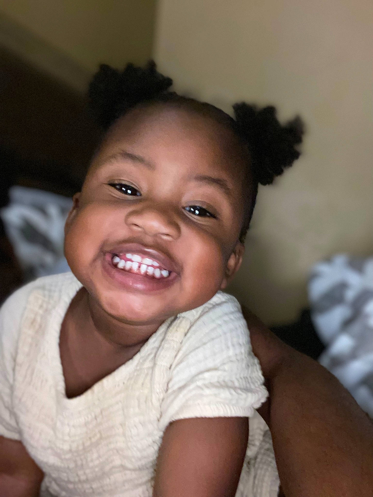 Justice joined the competition — help win amazing prizes! black_hair, cheek, chest, child, comfort, elbow, eyelash, flash_photography, gesture, happy, laugh, linens, lip, nose, person, portrait_photography, sitting, smile, t_shirt, toddler