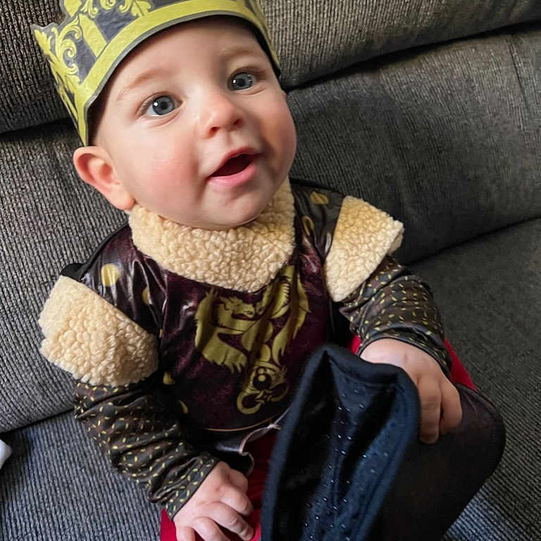 Chance joined the competition — help win amazing prizes! accessories, baby, baseballcap, bodypart, cap, clothing, coat, couch, cushion, face, furniture, hat, head, homedecor, jacket, pants, person, photography, portrait, sitting