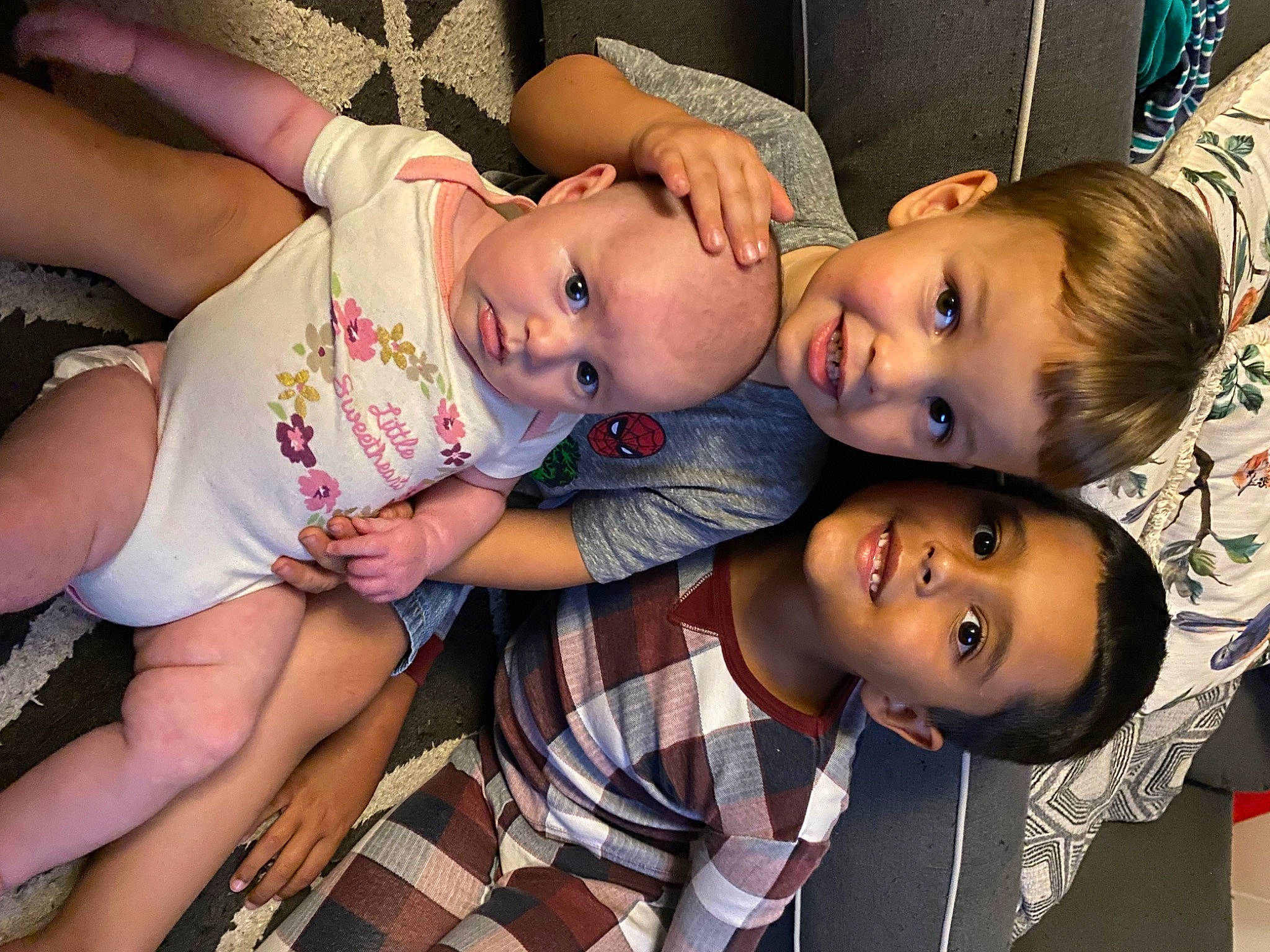 Silas joined the competition — help win amazing prizes! beauty, black_hair, cheek, cool, event, facial_expression, fun, happy, human_leg, iris, joy, mouth, nose, pattern, person, shorts, sitting, skin, smile, thigh