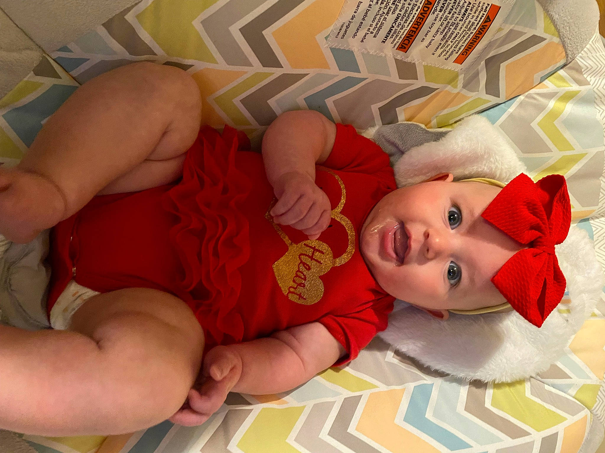 Lillian joined the competition — help win amazing prizes! baby, baby_products, baby_toddler_clothing, carmine, chest, child, comfort, elbow, finger, flooring, foot, happy, headwear, human_leg, linens, nail, pattern, person, room, skin