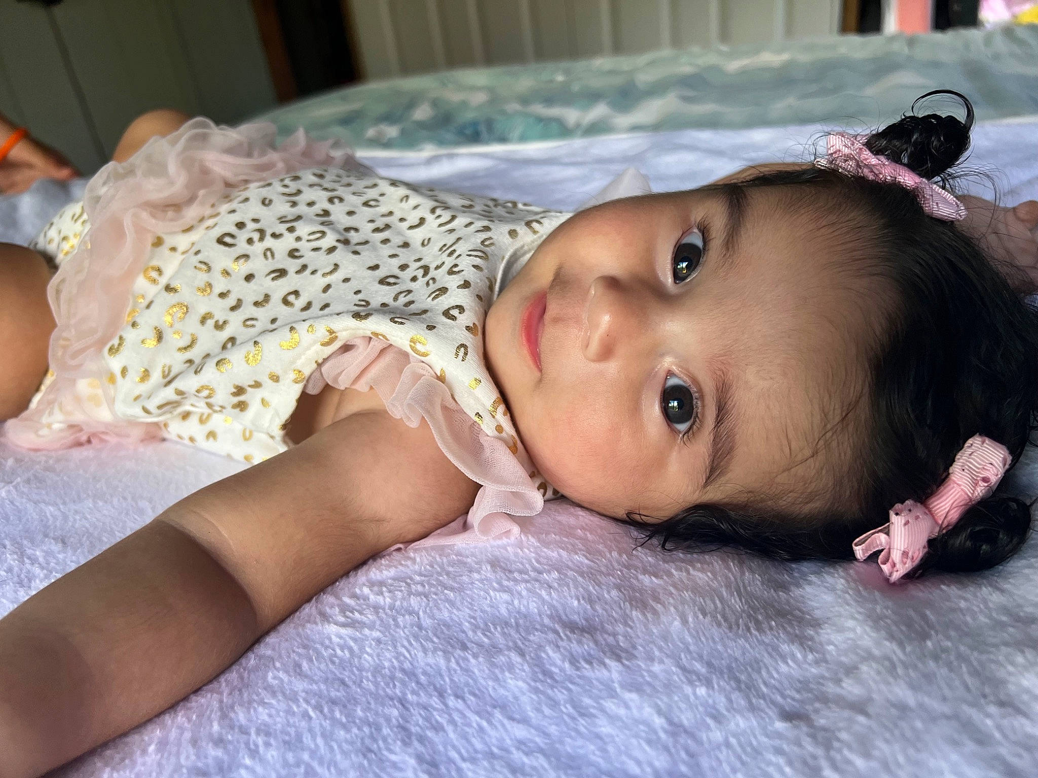 Kailani is registered to the contest to win money with this photo: baby, baby_toddler_clothing, cheek, child, comfort, dress, eye, eyebrow, eyelash, face, flash_photography, happy, head, headpiece, iris, lip, nose, person, skin, toddler