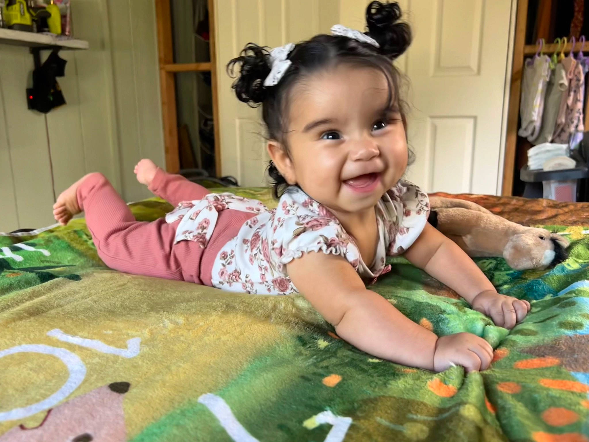 Kailani joined the competition — help win amazing prizes! baby, baby_toddler_clothing, child, event, eye, flooring, fun, grass, green, hair, happy, head, iris, joy, linens, pattern, person, shelf, skin, smile