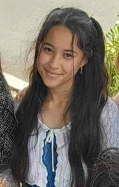 Nohealani is registered to the contest to win money with this photo: black_hair, brown_hair, cheek, eyebrow, eyelash, fur, grass, hair, happy, head, iris, joy, layered_hair, lip, long_hair, pattern, person, portrait_photography, skin, sleeve