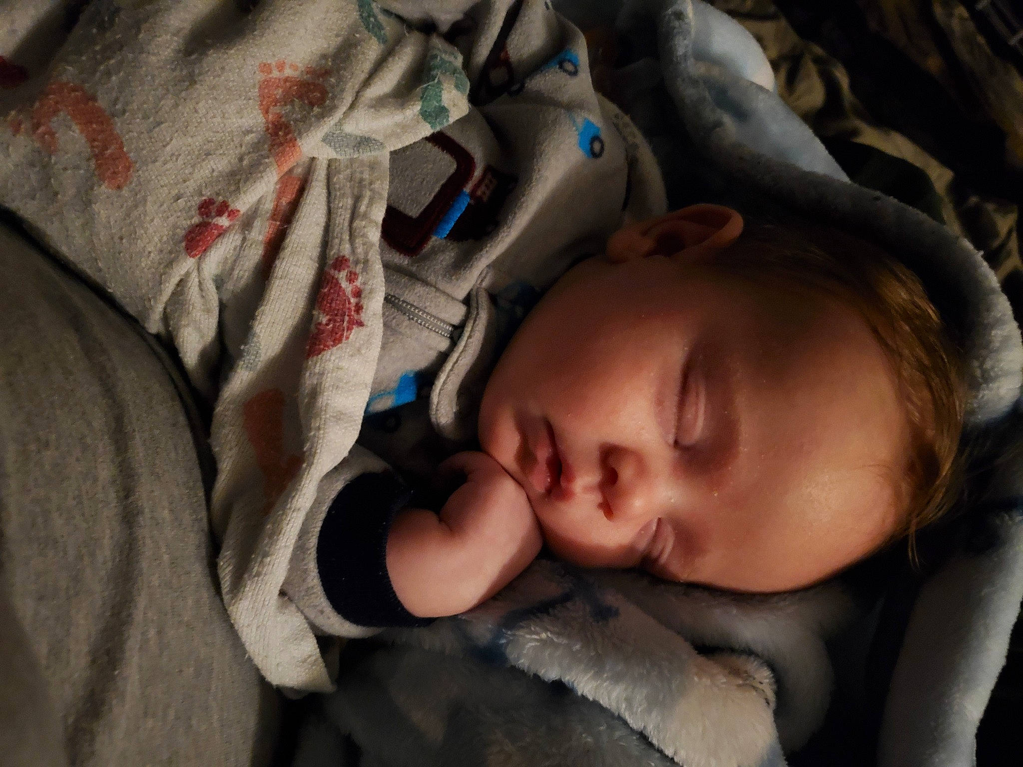 Björn is registered to the contest to win money with this photo: baby, baby_products, baby_toddler_clothing, bedtime, carmine, cheek, child, comfort, flash_photography, grey, linens, mouth, nap, nose, person, portrait_photography, room, skin, sleep, toddler