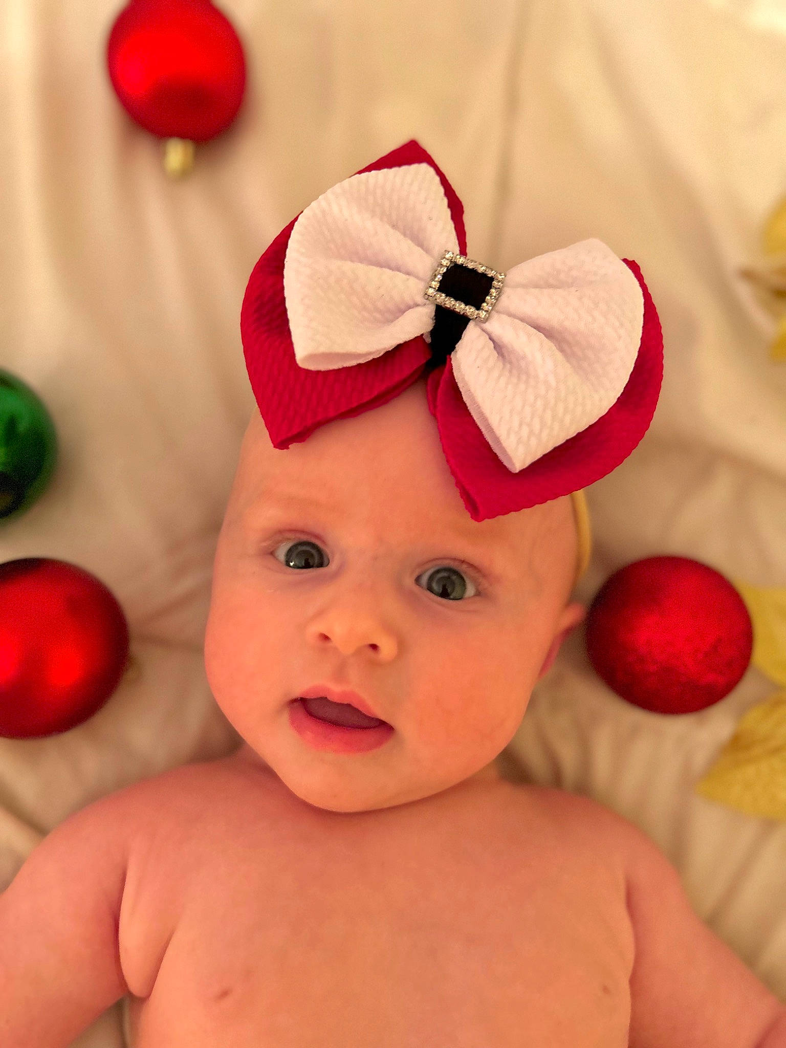 Mabel joined the competition — help win amazing prizes! arm, baby, baby_toddler_clothing, beauty, cap, child, costume_hat, hand, happy, headwear, human_body, lip, magenta, nose, organ, person, pink, red, skin, textile