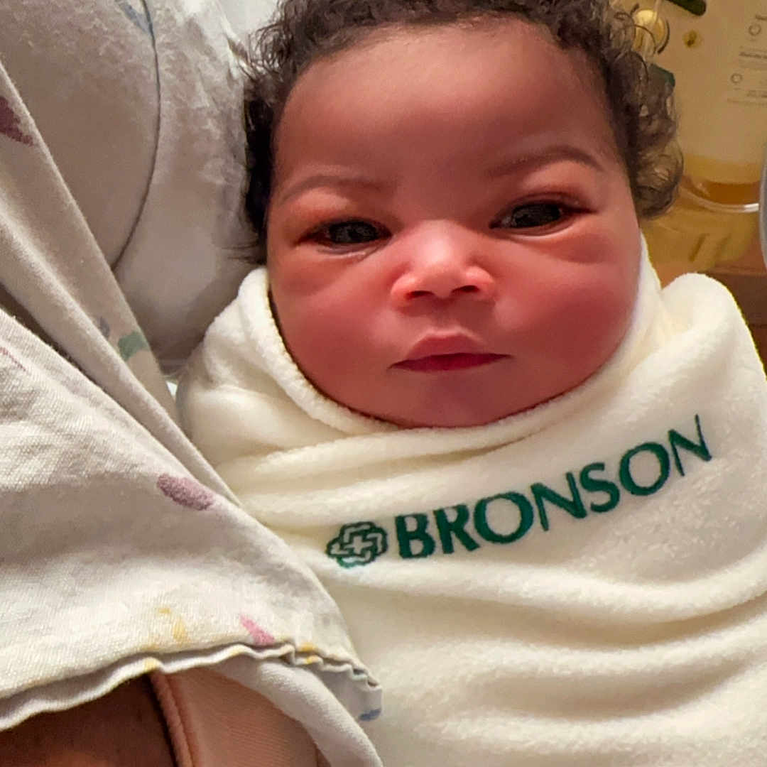 Jaziriah is registered to the contest to win money with this photo: architecture, baby, bed, bedroom, blanket, building, cushion, face, furniture, happy, head, homedecor, hospital, newborn, person, photography, portrait, sleeping, smile, towel